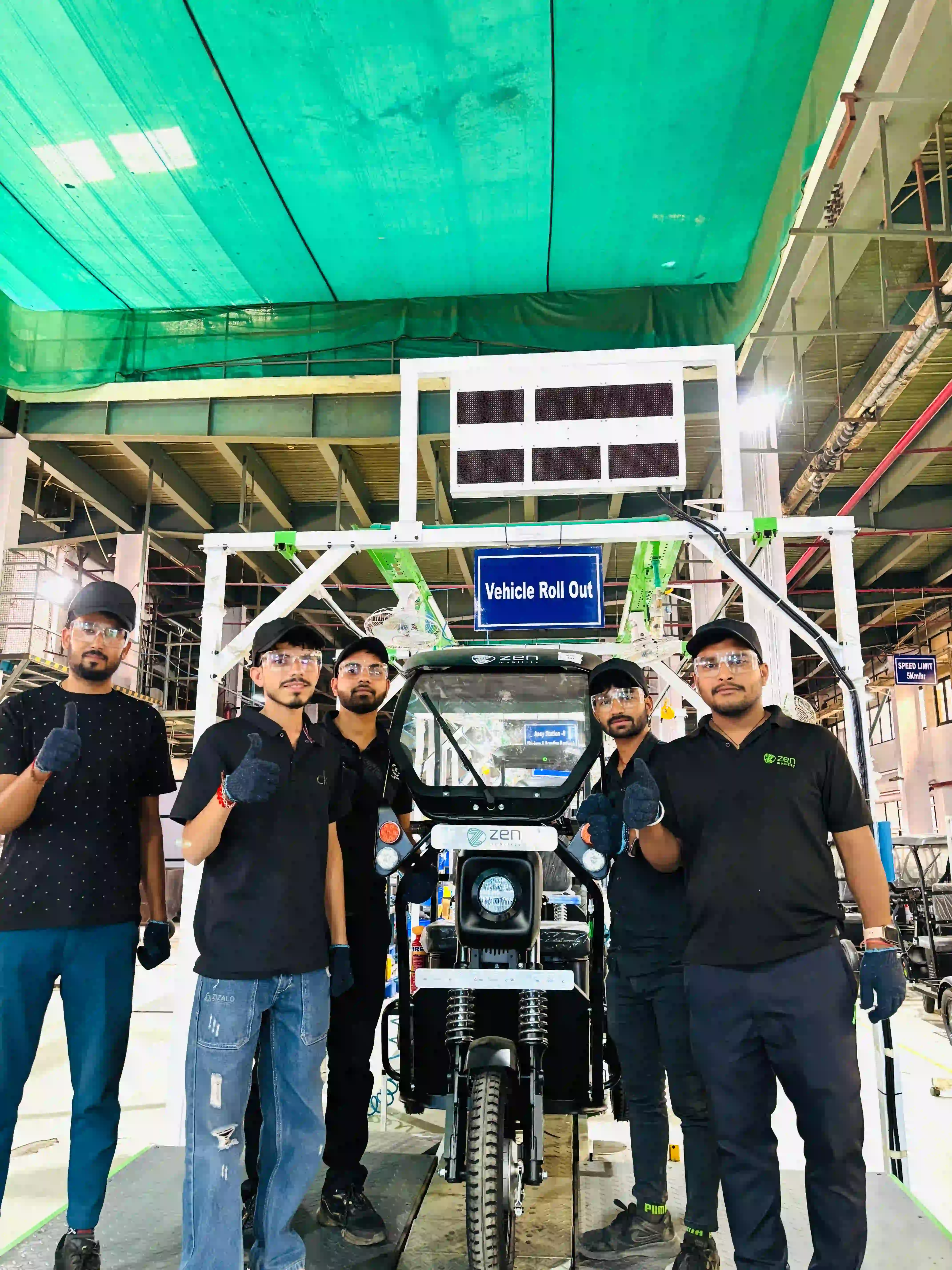 The production team at a vehicle roll-out